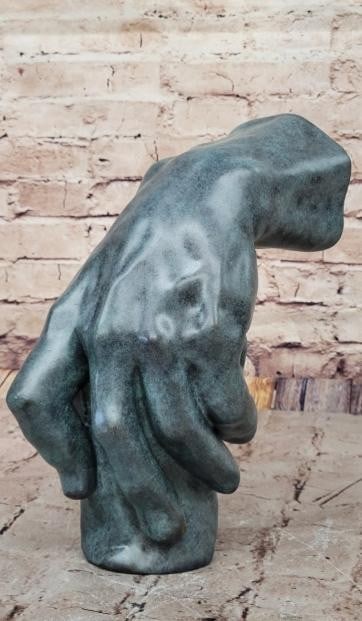 Anatomy in Art: The Sculpted Hand Bronze Sculpture: Anatomy in Art: The Sculpted Hand Bronze Sculpture. Inspired by sculptor Rodin and bearing the signature of artist Milo, this bronze sculpture masterfully captures the intricate details of the human h