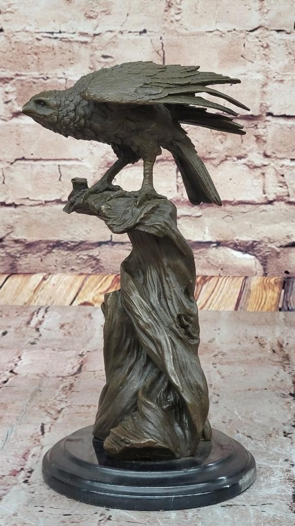 Perched Eagle Original Bronze Statue - 10.5'' x 5.5'': Perched Eagle Original Bronze Statue - 10.5x34 x 5.5 This bronze sculpture captures the regal presence of a sitting eagle, symbolizing strength and resilience. Finely detailed feathers and a sharp gaz
