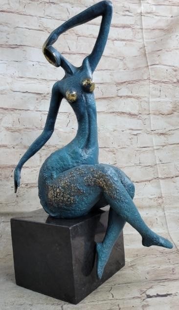 Abstract Sensual Nude Woman Bronze Sculpture: Abstract Sensual Nude Woman Bronze Sculpture An abstract female dancer sculpture. You can just tell this is a powerful dancer in the sharpness of her position. This wonderfully curvaceous woman bears 