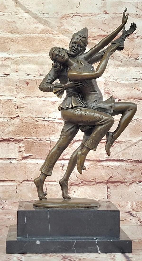 Carnaval Dancers by Otto Poertzel Bronze Sculpture on Marble Base - 12'' x 6'': Carnaval Dancers by Otto Poertzel Bronze Sculpture on Marble Base - 12" x 6" This elegant bronze sculpture, inspired by Otto Poertzel's celebrated Carnaval Dancers, captures two graceful figur