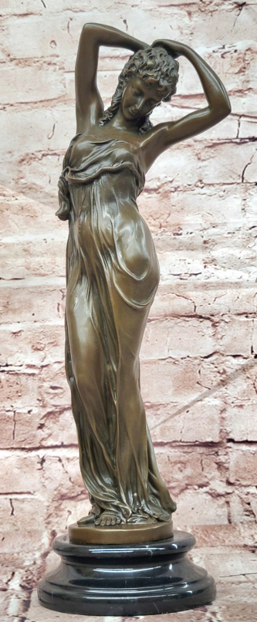Art Nouveau Female Figure Bronze Statue with Raised Arms - 15'' x 4.5'': Art Nouveau Female Figure Bronze Statue with Raised Arms - 15" x 4.5" This elegant bronze sculpture portrays a graceful female figure with raised arms, embodying the flowing lines and natural 