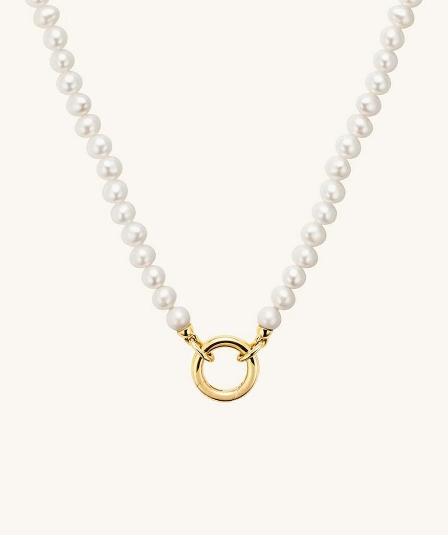 18'' Classic Gold Ring Pendant with Lustrous Pearl: 18" Classic Gold Ring Pendant with Lustrous Pearl This 18" classic necklace features a stunning gold ring pendant paired with a lustrous pearl, creating an elegant and timeless design. Finishe