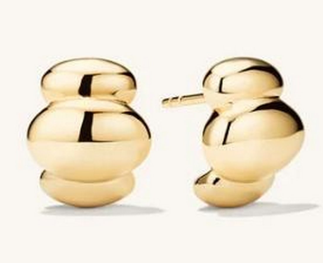 Gold Vermeil Cloud Studs: Gold Vermeil Cloud Studs These earrings offer a whimsical yet elegant design. Crafted from gold vermeil, each stud features a delicate cloud shape with a polished finish, making them a charming and