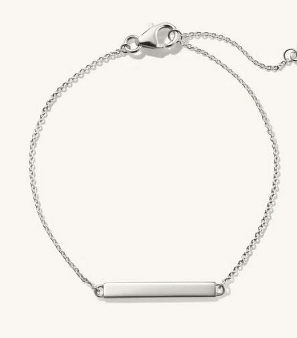 The Timeless Script Sterling 925 Silver Bracelet: The Timeless Script Sterling 925 Silver Bracelet. This sleek silver bar bracelet features a minimalist design, offering a clean and sophisticated look. Crafted in 925 sterling silver, it's perfect