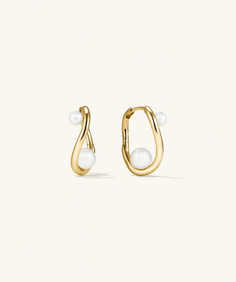 Gold Vermeil Contour Pearl Hoops: Gold Vermeil Contour Pearl Hoops We imagined what our favorite sculptural hoops might look like threaded with pearls of varying sizes - and the result exceeded our expectations. Elegant yet