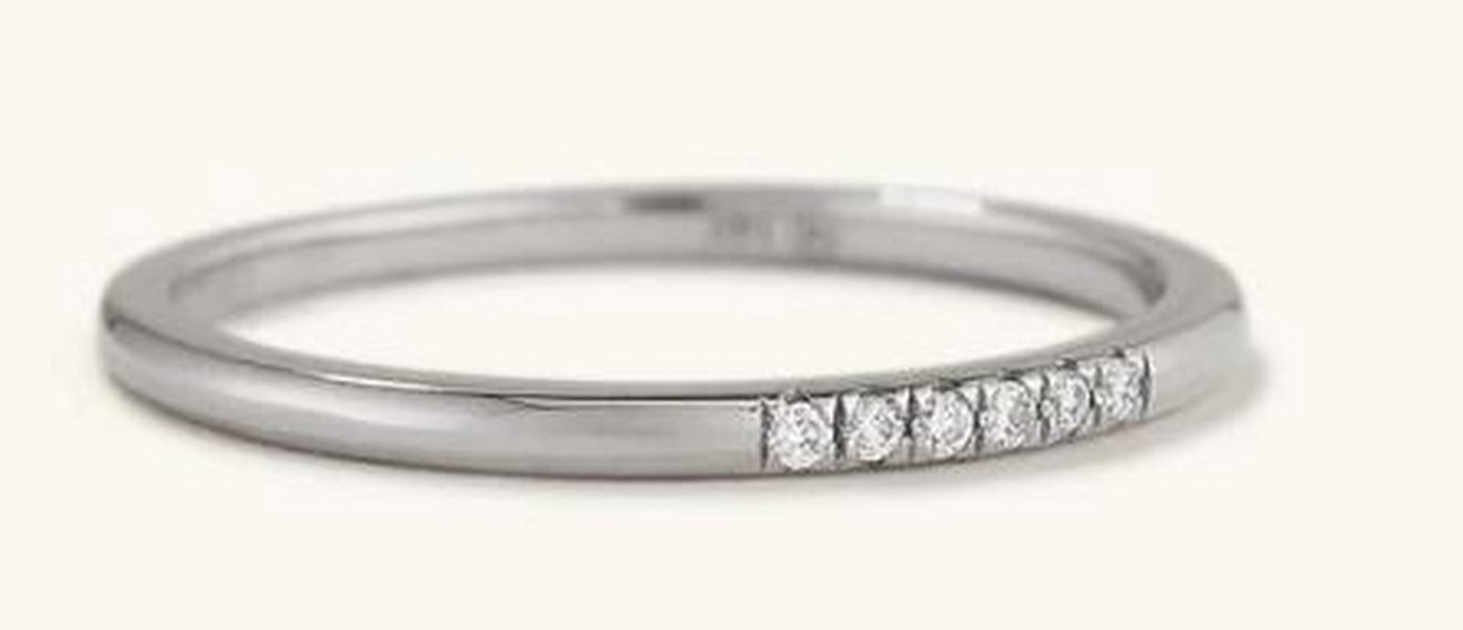 Natural Diamond And White Gold Horizon Ring: Natural Diamond And White Gold Horizon Ring. A symbol of elegance and timeless beauty, this ring features a stunning row of brilliant natural diamonds set in 14K white gold. The diamonds line the