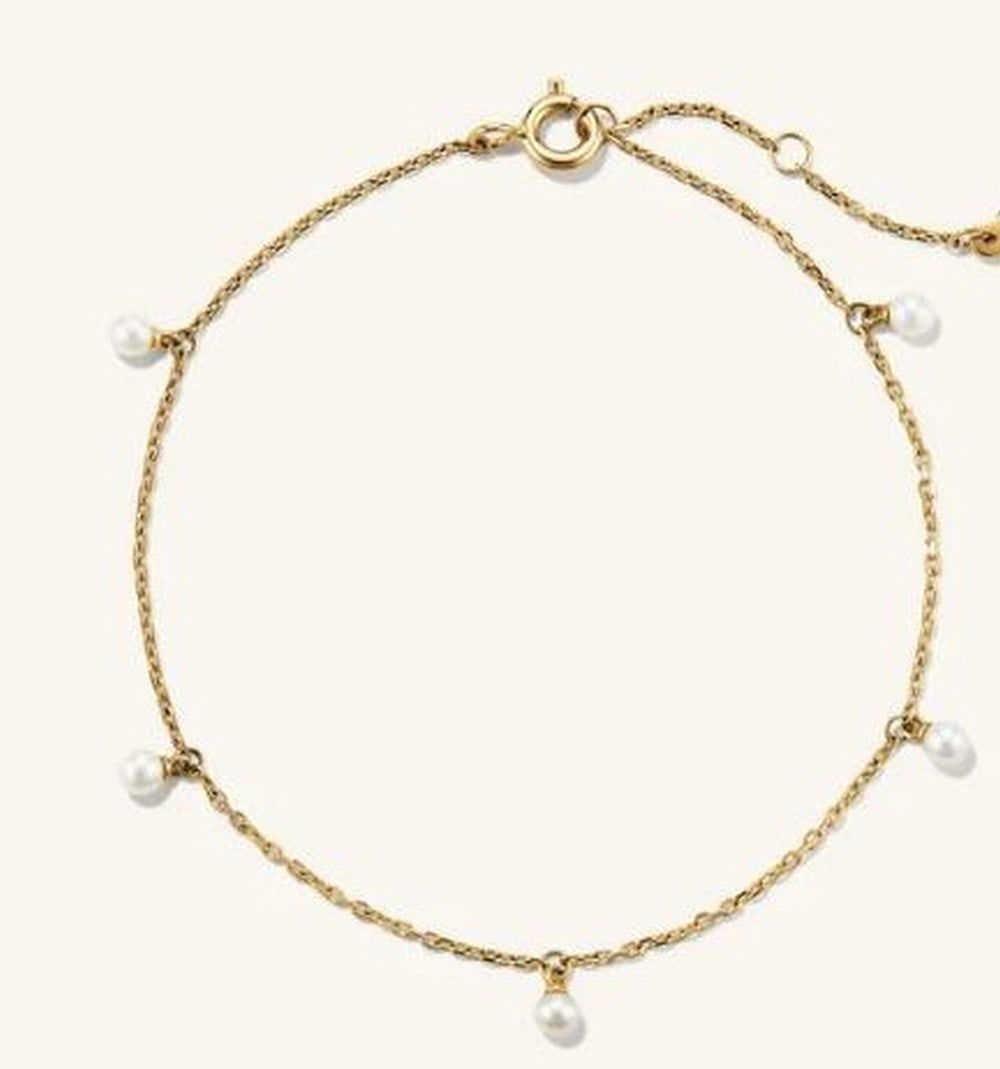 14K Gold & Freshwater Pearl Bracelet: 14K Gold &; Freshwater Pearl Bracelet. Crafted in radiant 14K yellow gold, this exquisite bracelet showcases a delicate arrangement of lustrous freshwater pearls, exuding timeless elegance and sophist