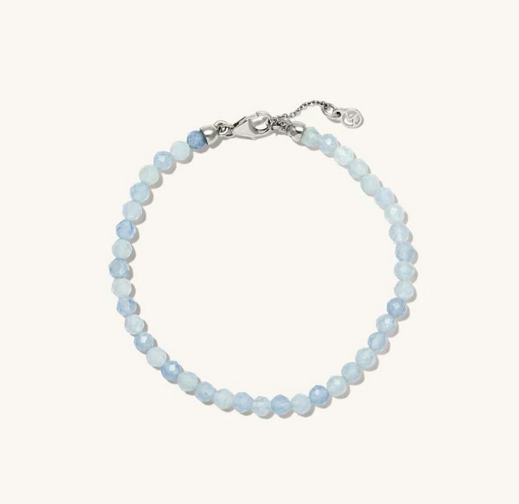 Chic Bead Bracelet: Chic Bead Bracelet Make a statement with bold gemstone beads in a mix of shades with the Chic Bead Bracelet. Stack a few for layers of texture and color - an ideal way to complete any look. Crafted