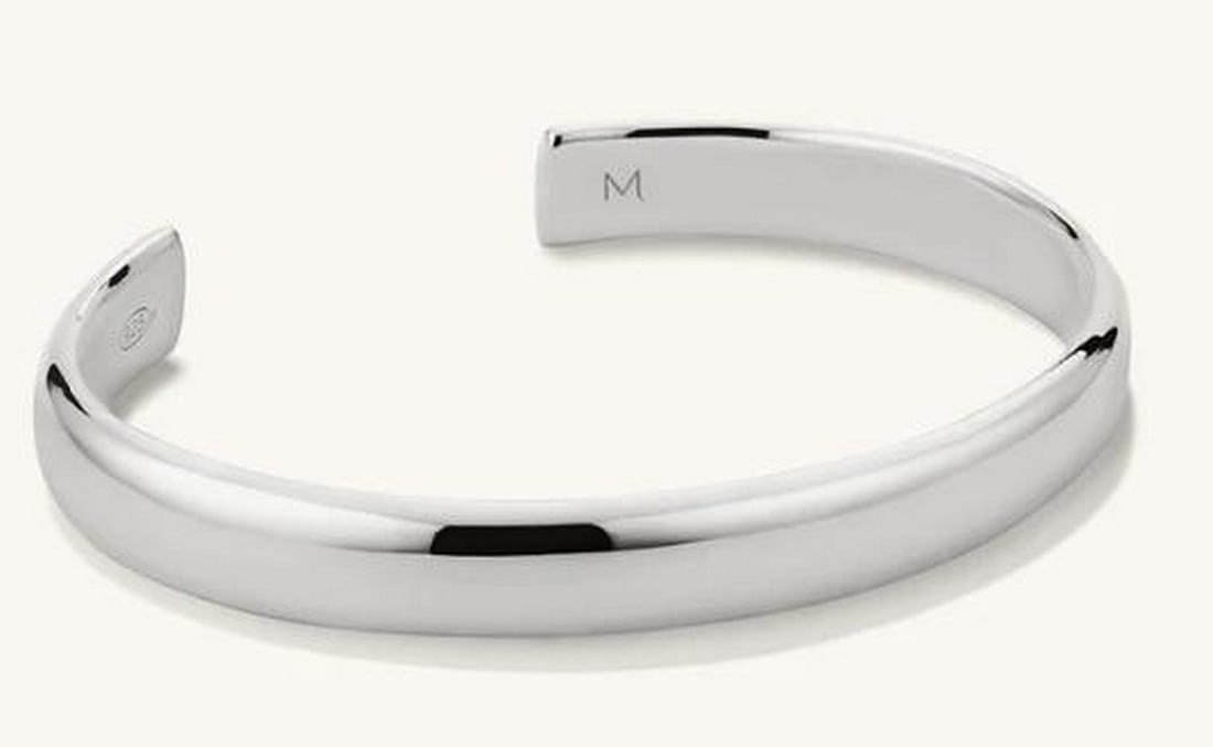 Sterling Silver Cuff Bracelet: 925 Sterling Silver Cuff Bracelet This bracelet is a timeless and versatile piece that radiates understated elegance. Crafted from 925 sterling silver, this sleek, smooth cuff features a minimalist de