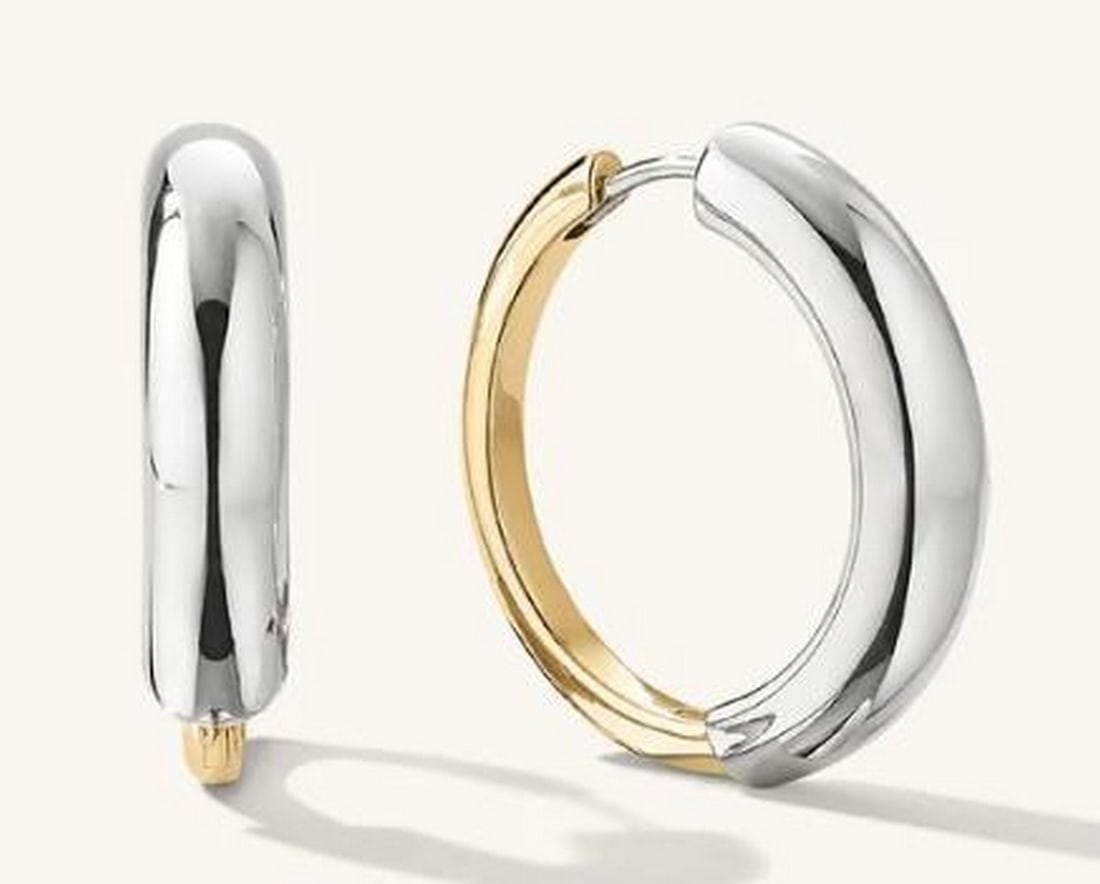 Gold Vermeil And Sterling Silver Mixed Hoops: Gold Vermeil And Sterling Silver Mixed Hoops. Elevate your style with the perfect balance of sophistication and modern flair. These earrings combine the rich, warm glow of gold vermeil with the sleek,