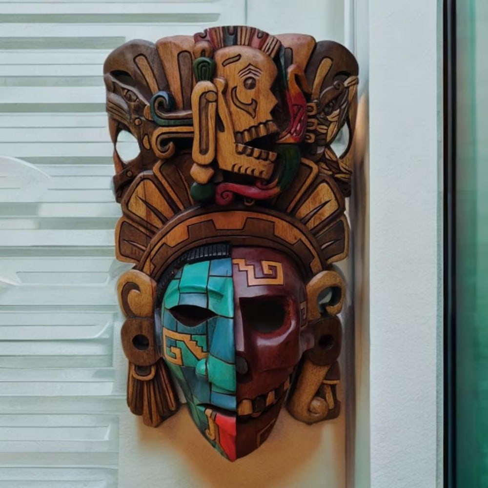 Hand Carved Mayan Mask of ''Yum Kimil'': Hand Carved Mayan Mask of "Yum Kimil" The upper portion of this intricately carved Mayan mask features an engraving of Yum Kimil, the formidable god of death, also known as the "Lord of De