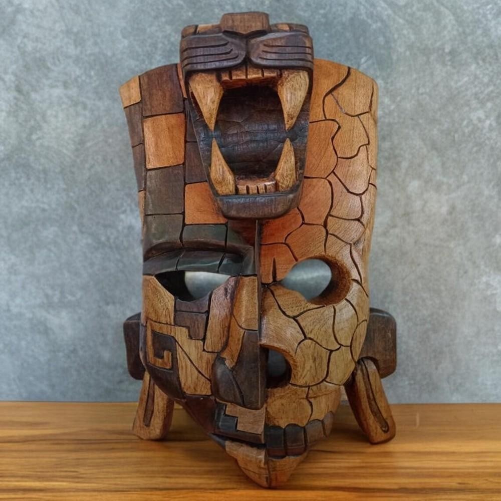 Mayan Spirit Wooden Mask: Mayan Spirit Wooden Mask Hand-carved from rich cedar wood, this vibrant mask embodies the spiritual essence of Mayan culture. Inspired by ancient ceremonial masks, it features intricate detailing and 