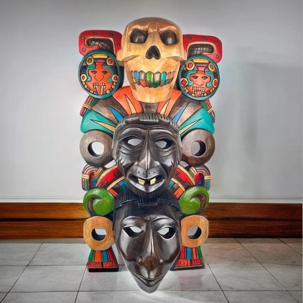 Three Stages of Life Mayan Mask: Three Stages of Life Mayan Mask This masterfully hand-carved cedar wood mask embodies the Mayan belief in the cycles of life. Its layered design represents three distinct stages: the inner face symbol