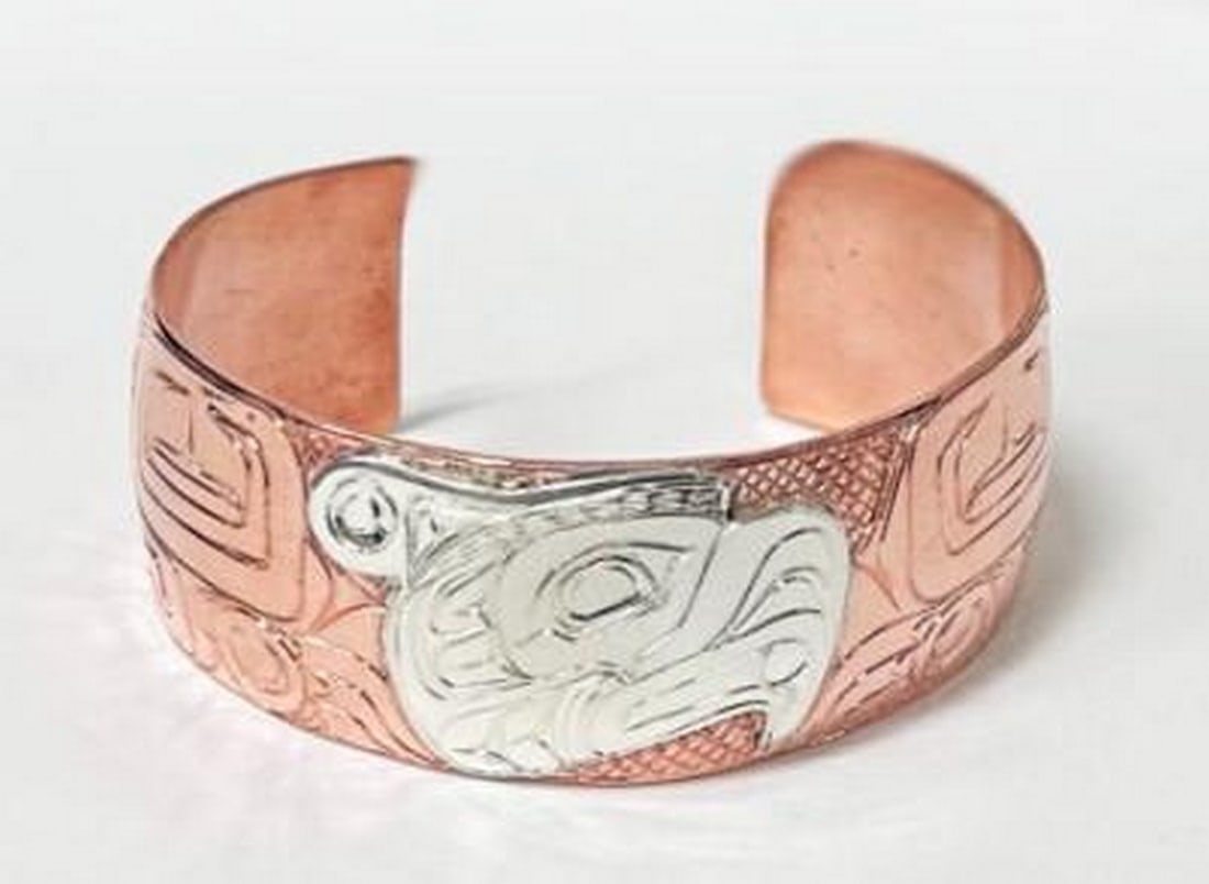Wings of Thunder Bangle: Wings of Thunder Bangle Crafted from radiant copper, the Wings of Thunder Bangle channels the raw power of the Thunderbird. Etched with bold, dynamic lines, its design captures the spirit of the