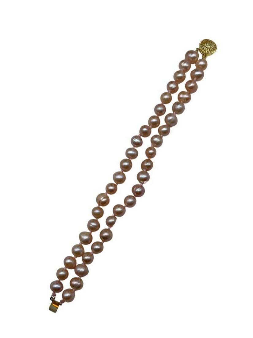 Genuine Natural Pink Freshwater 7-8mm Pearl Double Strand Bracelet: Genuine Natural Pink Freshwater 7-8mm Pearl Double Strand Bracelet. A Warm Color Of Pink Accompanies Each Pearl In The Bracelet. With 40+ Pearls In A Double Strand Design With Push Pin Wheel Gold 