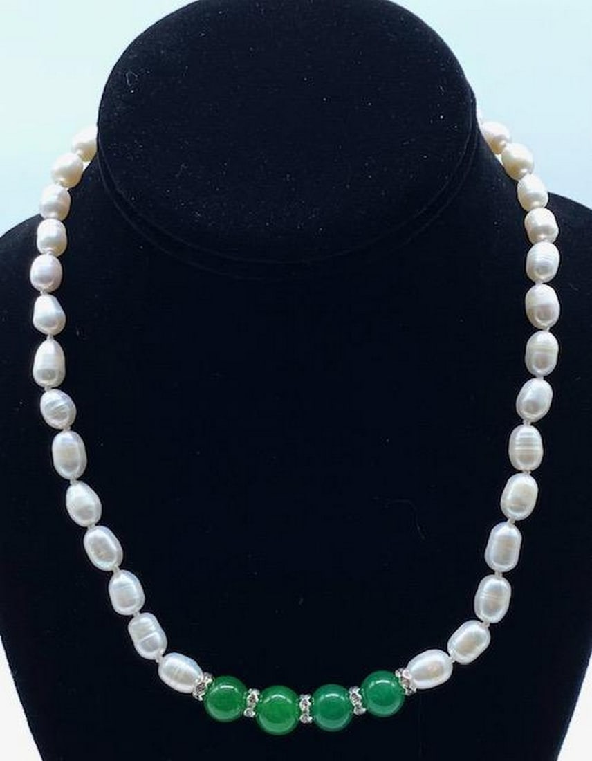 18'' Natural 7mm-8mm White Rice Akoya Pearl & Green Jade Necklace *AAA*: 18" Natural 7mm-8mm White Rice Akoya Pearl &; Green Jade Necklace *AAA*. 4 Green Jade Polished Orbs Sided By Crystal Beads Decorates This 7mm-8mm White Rice Akoya Pearl Necklace. Each Pearl Shows 