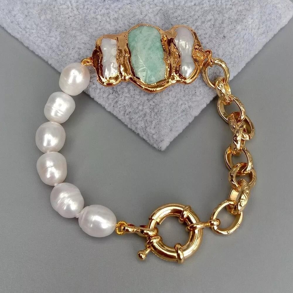 Cultured White Rice Pearl and Amazonite Chain Bracelet: Cultured White Rice Pearl and Amazonite Chain Bracelet This elegant 8" bracelet combines the beauty of cultured white rice pearls with the vibrant tones of Amazonite stone. The unique texture and 