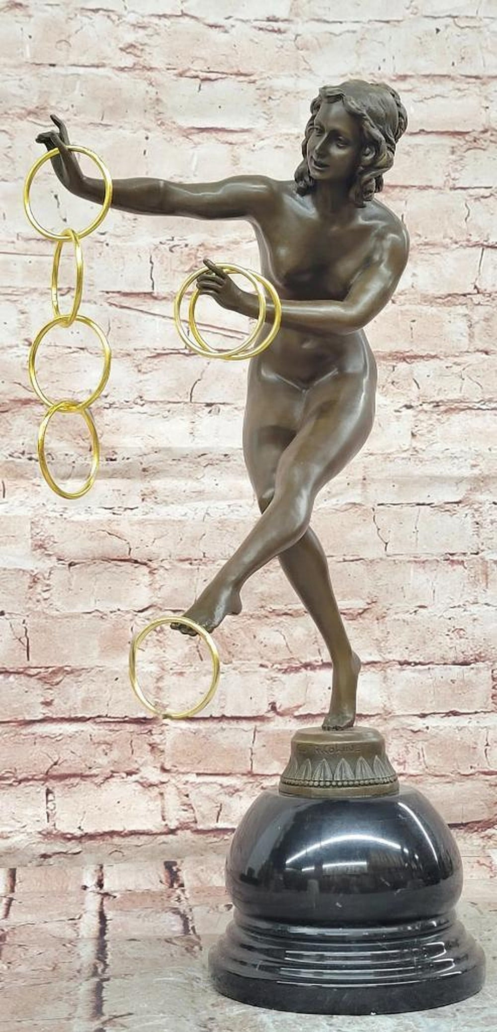 Art Deco Ring Dancer Bronze Sculpture in the Manner of Colinet - 18'' x 7.5'': Art Deco Ring Dancer Bronze Sculpture in the Manner of Colinet - 18" x 7.5" Introducing a Striking Bronze Sculpture: This depiction of a graceful ring dancer is meticulously handcrafted with c