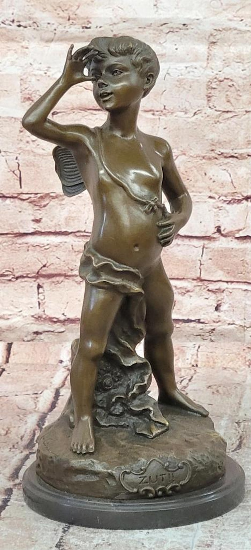 Mischievous Boy Bronze Sculpture in the Manner of Alphonse Colle - 14'' x 6.5'': Mischievous Boy Bronze Sculpture in the Manner of Alphonse Colle - 14" x 6.5" Introducing a Playful Bronze Sculpture: This depiction of a young boy thumbing his nose is meticulously handcrafte