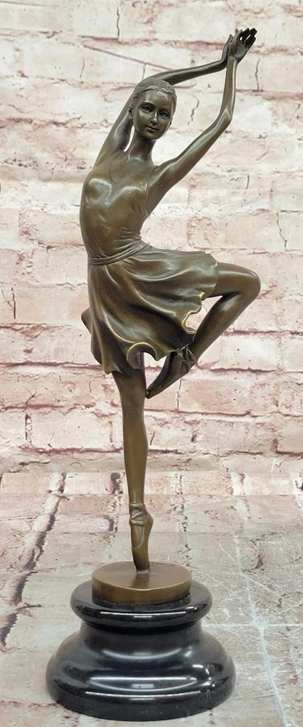 Cesaro Bronze Ballerina Sculpture - 14'' x 7'': Cesaro Bronze Ballerina Sculpture - 14" x 7" This original bronze sculpture by Cesaro depicts a graceful ballerina poised en pointe, capturing elegance, balance, and fluid movement. The figure