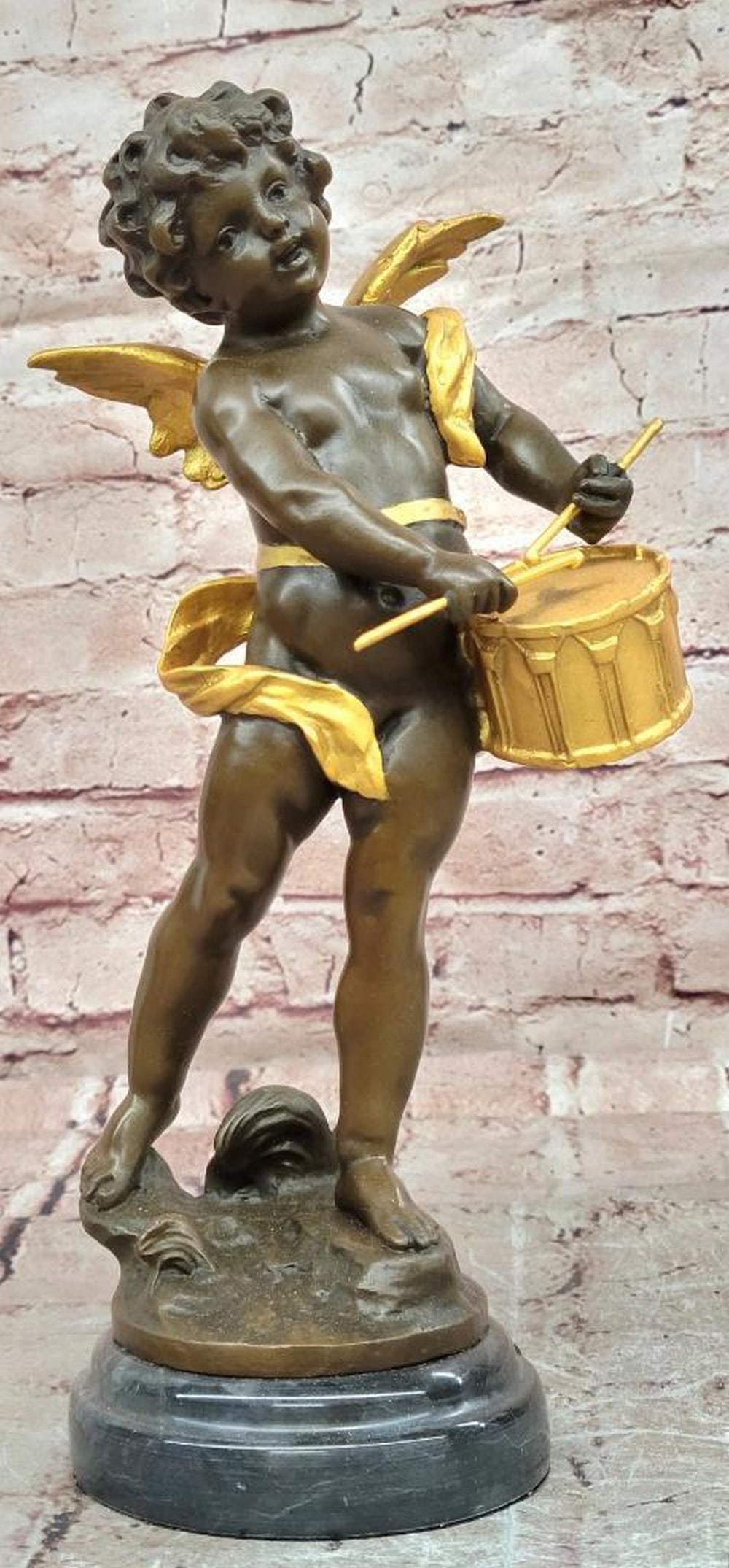 Moreau Inspired Bronze Cherub Drummer Sculpture - 12'' x 5'': Moreau Inspired Bronze Cherub Drummer Sculpture - 12" x 5" This original bronze sculpture depicts a lively cherub drummer, inspired by the classical artistry of Auguste Moreau. The figure capt