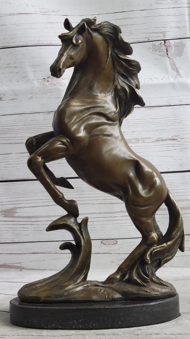M. Lopez Rearing Horse Bronze Sculpture On Marble Base - 12'' x 7'': M. Lopez Rearing Horse Bronze Sculpture On Marble Base - 12" x 7" Wild and untamed, this powerful horse rears onto its hind legs, its mouth open in a fierce neigh that warns both humans and an