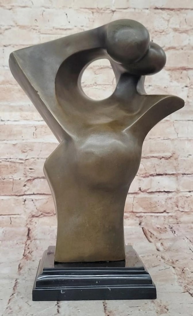 Eternal Embrace Abstract Bronze Lovers: Eternal Embrace Abstract Bronze Lovers This abstract bronze sculpture captures the intimate moment of two humans kissing, rendered with minimal detail and fluid, unified forms. The figures merge in a 