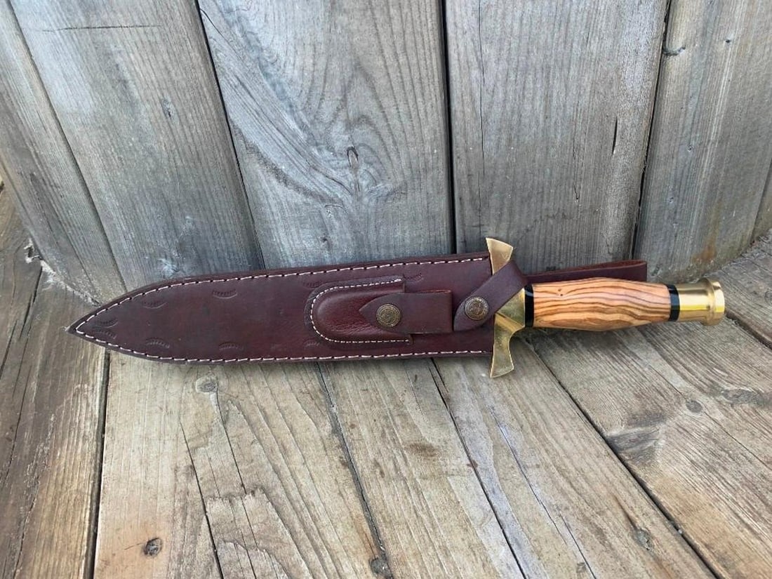 The Spartans Damascus Dagger: Custom Handmade Damascus Steel Dagger Hunting Dagger Knife Handle Olive Wood with Brass Spacer Damascus Steel Blade with 256 Layers on it. HARDNESS 56-60 H R C VERY HIGH QUALITY GENUINE LEATHER SHEATH