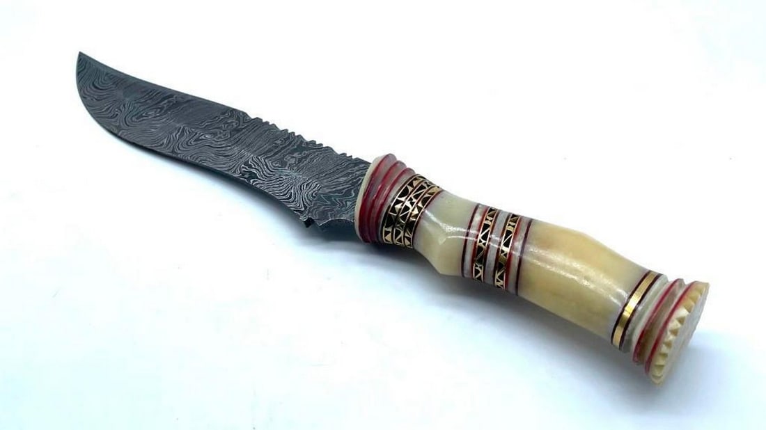 Damascus Trailing Point Custom Design Brass Inlaid Handled Hunting Knife: Damascus Trailing Point Custom Design Brass Inlaid Handled Hunting Knife. Damascus Steel Blade with 256 Layers on it. HARDNESS 56-60 H R C VERY HIGH QUALITY GENUINE LEATHER SHEATH View Photos For