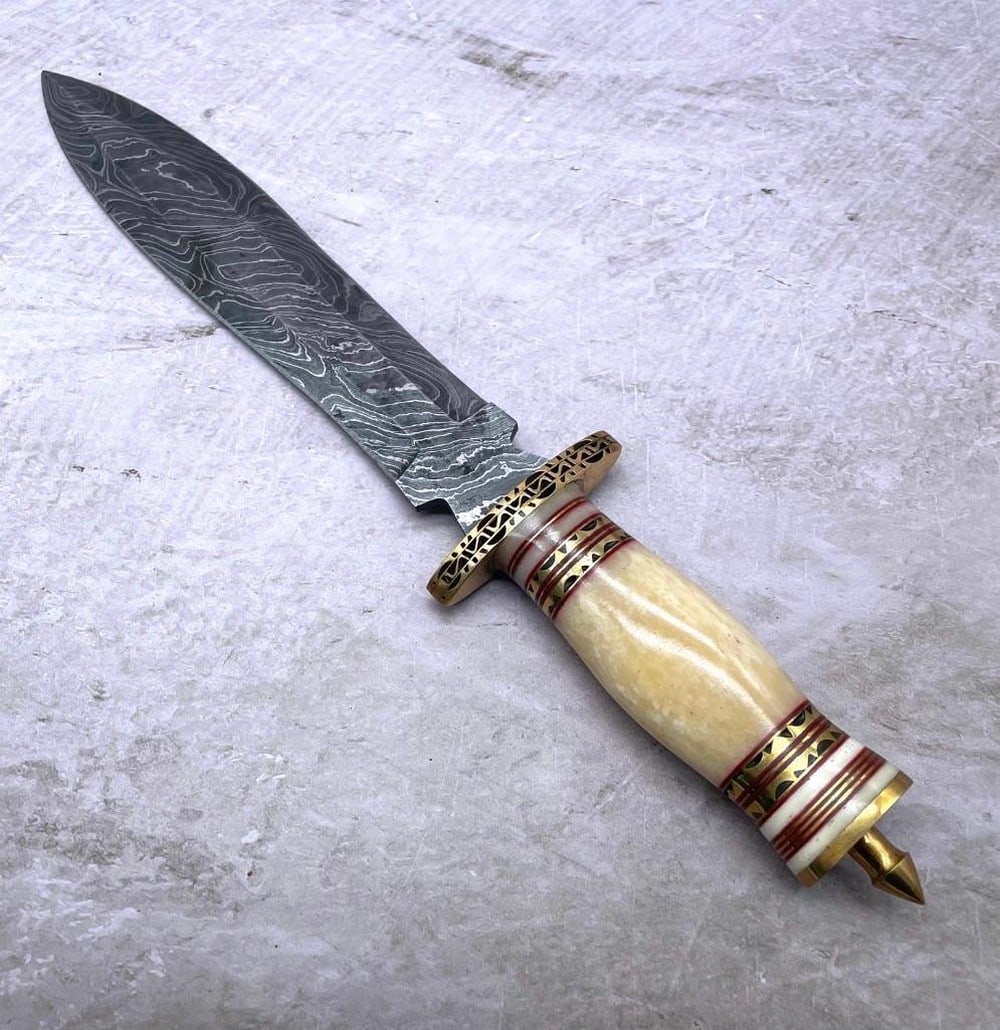 The Wretched Damascus Dagger: Custom Handmade Damascus Steel Hunting Dagger Knife Handle Camel Bone with Brass Spacer. Damascus Steel Blade with 256 Layers on it. HARDNESS 56-60 H R C VERY HIGH QUALITY GENUINE LEATHER SHEATH