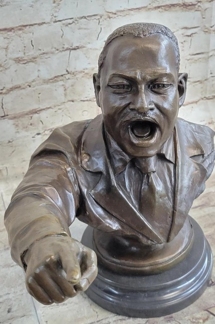 Martin Luther King Jr. Bust Bronze Sculpture - 12'' x 15'': Martin Luther King Jr. Bust Bronze Sculpture- 12" x 15" Martin Luther King Jr. was an eloquent black Baptist minister who lead the civil-rights movement in the United States from the mid-1950s
