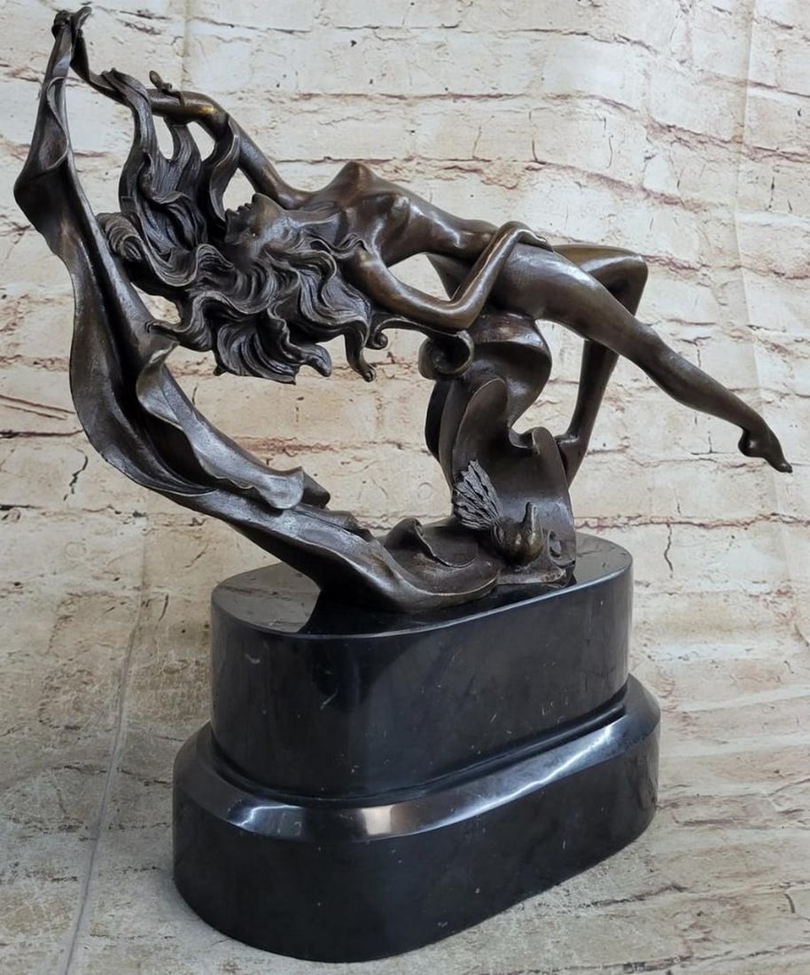 Liberation Bronze Dancer Original Sculpture Signed by G. Michiel - 14'' x 7'': Liberation Bronze Dancer Original Sculpture Signed by G. Michiel - 14" x 7" Immerse yourself in the essence of freedom and self-expression with this captivating bronze sculpture. Depicting a n