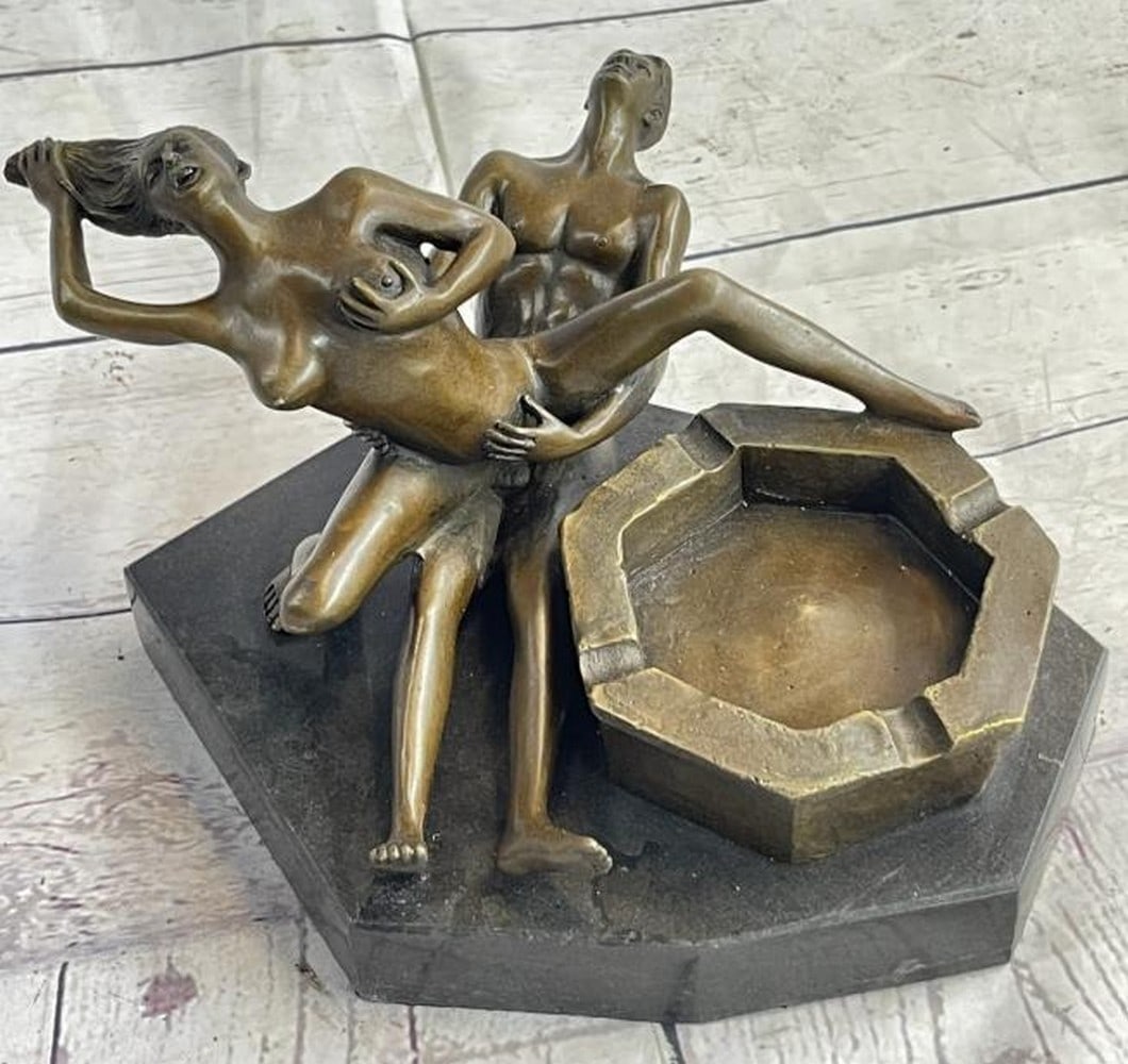 Erotic Bronze Sculpture Ashtray Reproduction: Erotic Bronze Sculpture Ashtray Reproduction. This unique bronze metal ashtray sculpture, a reproduction and bearing the signature of the renowned artist Mavchi, blends functional design with the allu