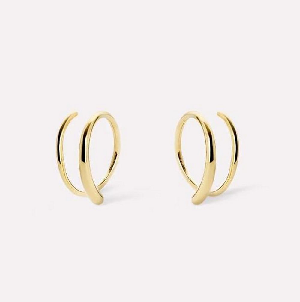 14K Gold Swirl Double Hoop Earrings: 14K Gold Swirl Double Hoop Earrings These earrings feature a sleek double-hoop swirl design that gives the look of two piercings in one. Crafted from recycled sterling silver and finished in 14K gold,