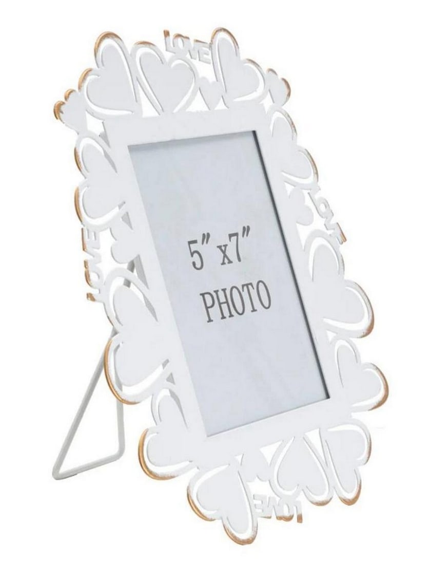 Little Hearts White Metal Love Photo Frame: Little Hearts White Metal Love Photo Frame White metal photo frame featuring heart-shaped inlays that add a touch of lightness and love to any space. The frame combines white and golden finishes with