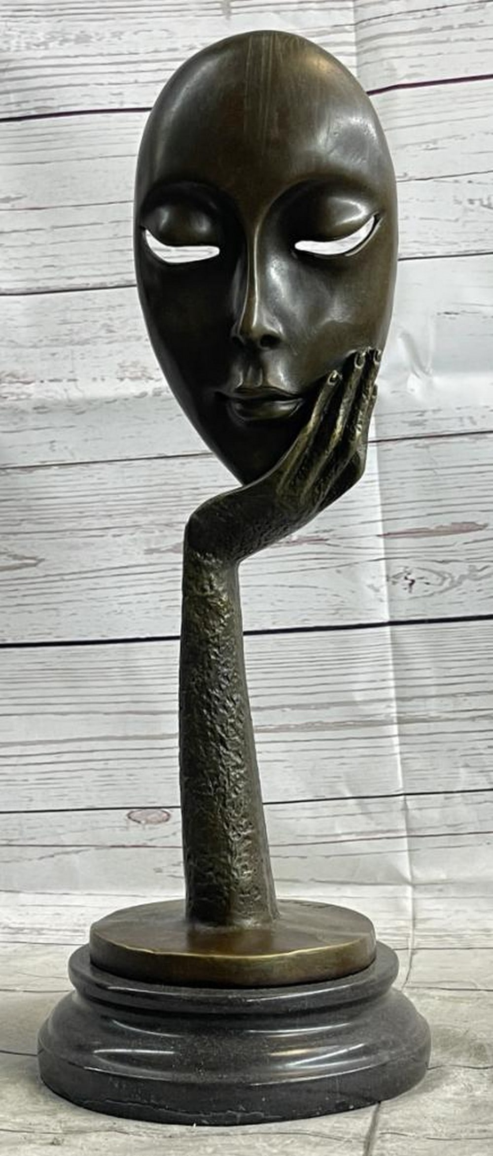Fransisci's 'Thinking Woman' Surrealist Bronze Sculpture - 15.5'' x 5.5'': Fransisci's 'Thinking Woman' Surrealist Inspired Bronze Sculpture - 15.5" x 5.5" Immerse yourself in the surrealistic realm with Fransisci's "Thinking Woman" bronze sculpture. This cap