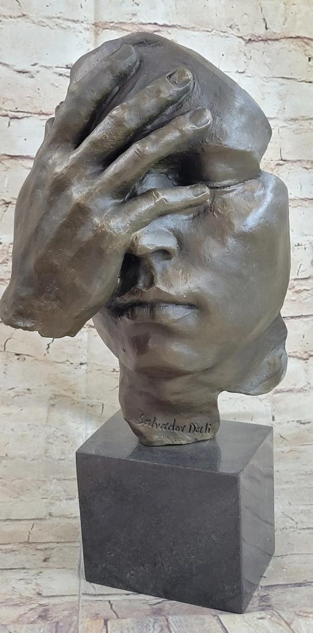 Dreamscape Echo Salvador Dali-Inspired Surreal Face Hand Bronze Statue Sculpture - 17'' x 9'': Dreamscape Echo Salvador Dali-Inspired Surreal Face Hand Bronze Statue Sculpture - 17" x 9" Behold an extraordinary work of art that will leave you awe-inspired - the Abstract Man Bronze Sculp