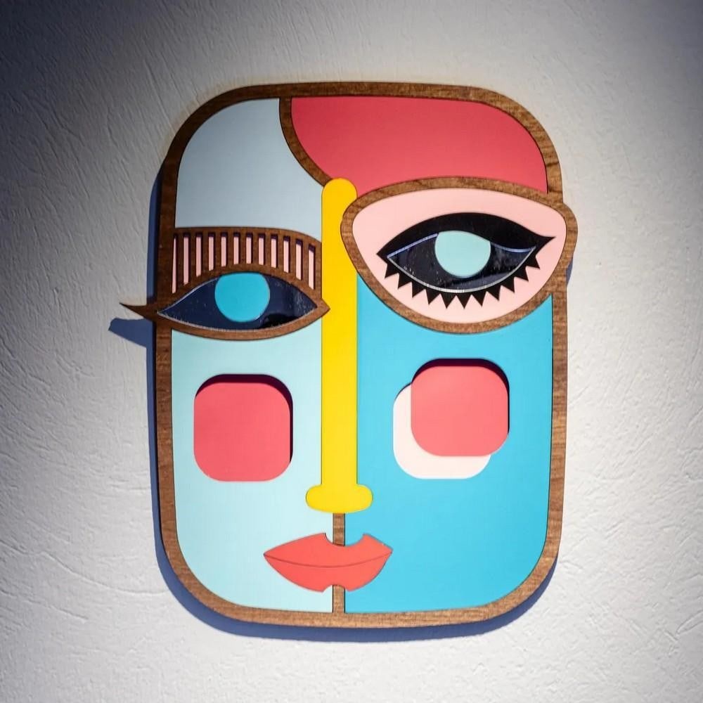 Abstract Essence Hand-Carved Wooden Mask: Abstract Essence Hand-Carved Wooden Mask Add a touch of modern artistry to your space with this handcrafted abstract wooden wall mask. Skillfully carved and designed to evoke mystery and expression, t