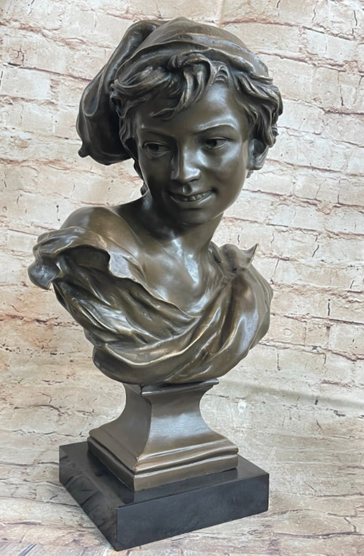 Italian Boy From The Bygone Era Bronze Bust On Marble Base - 17'' x 12'': Italian Boy From The Bygone Era Bronze Bust On Marble Base - 17" x 12" This exquisite bronze bust, designed by Dalou, captures the essence of an Italian adolescent boy from a bygone era. Dress
