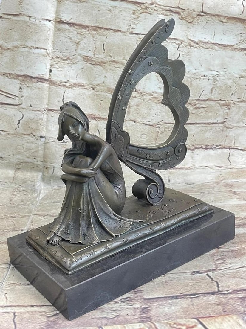 Angel Fairy Frame Picture Holder Bronze Sculpture: Angel Fairy Frame Picture Holder Bronze Sculpture It is said that fairies are supernatural beings who occupy a limbo between earth and heaven. Being both good and evil, fairies are nature spirits livi