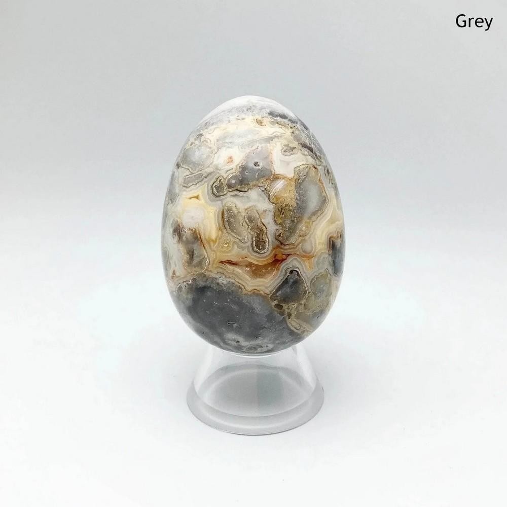 Crazy Lace Agate Mini Egg: Crazy Lace Agate Mini Egg Crazy lace agate, also called the laughter stone, is associated with joy, optimism, and uplifting energy. Found in Brazil, it is believed to stimulate the mind, promote