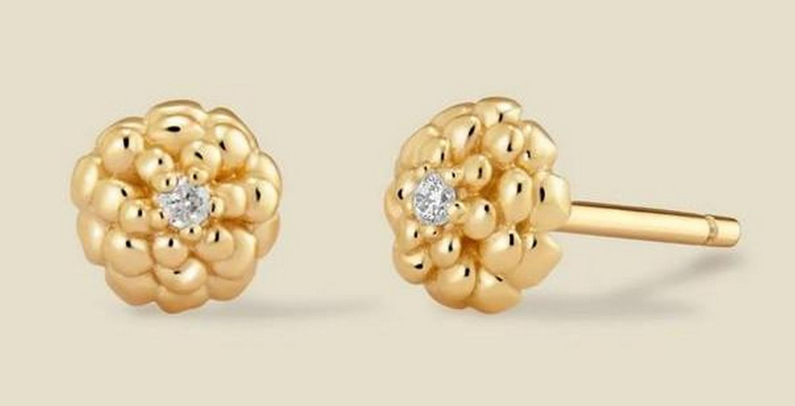 Gold Vermeil Cubic Zirconia Stud Earrings: Gold Vermeil Cubic Zirconia Stud Earrings A timeless stud design featuring prong-set cubic zirconia stones for a sparkling, elegant look. Perfectly sized for everyday wear or layering with other