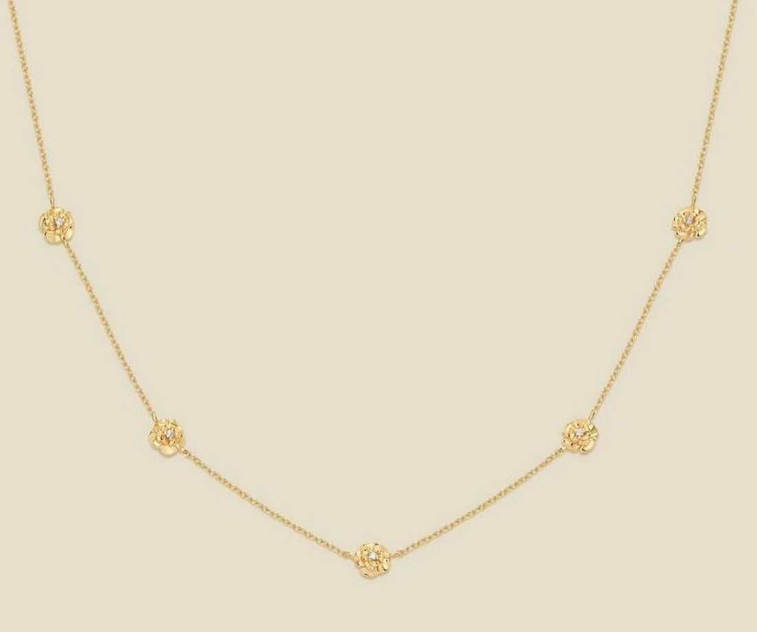 Gold Vermeil January Carnation CZ Necklace: Gold Vermeil January Carnation CZ Necklace This delicate necklace features lifelike January carnation silhouettes accented with prong-set cubic zirconia for subtle sparkle. Crafted in gold vermeil,