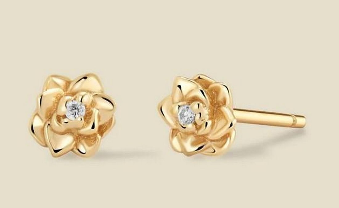 June Rose CZ Stud Earrings: June Rose CZ Stud Earrings Petite and powerful, these lifelike June rose silhouettes are set with CZ sparkle for a soft, radiant finish. A symbol of love, purpose, and the pursuit of what calls to