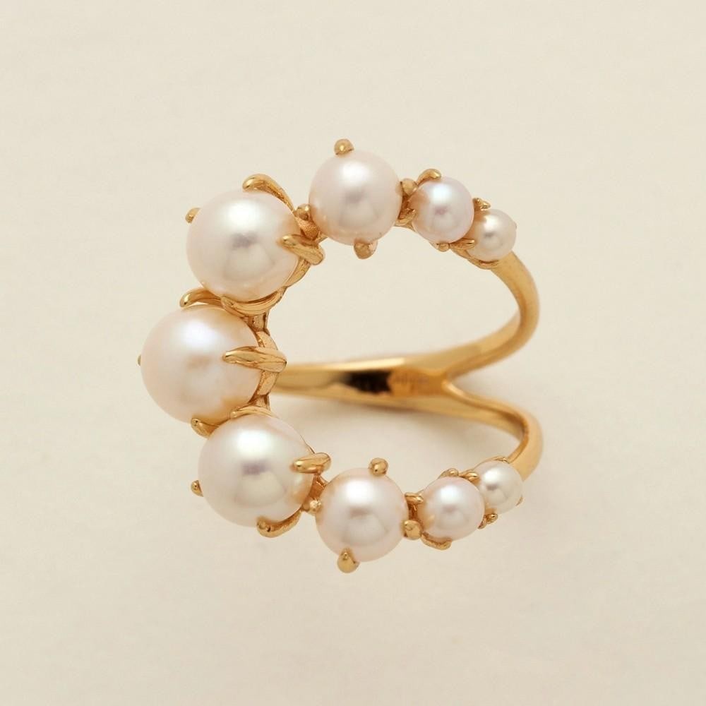 Lustrous Cascade Pearl Ring - Size 5: Lustrous Cascade Pearl Ring - Size 5 Playful yet sophisticated, the Lustrous Cascade Pearl Ring brings vintage charm with a modern edge. A radiant cluster of freshwater pearls flows elegantly across a