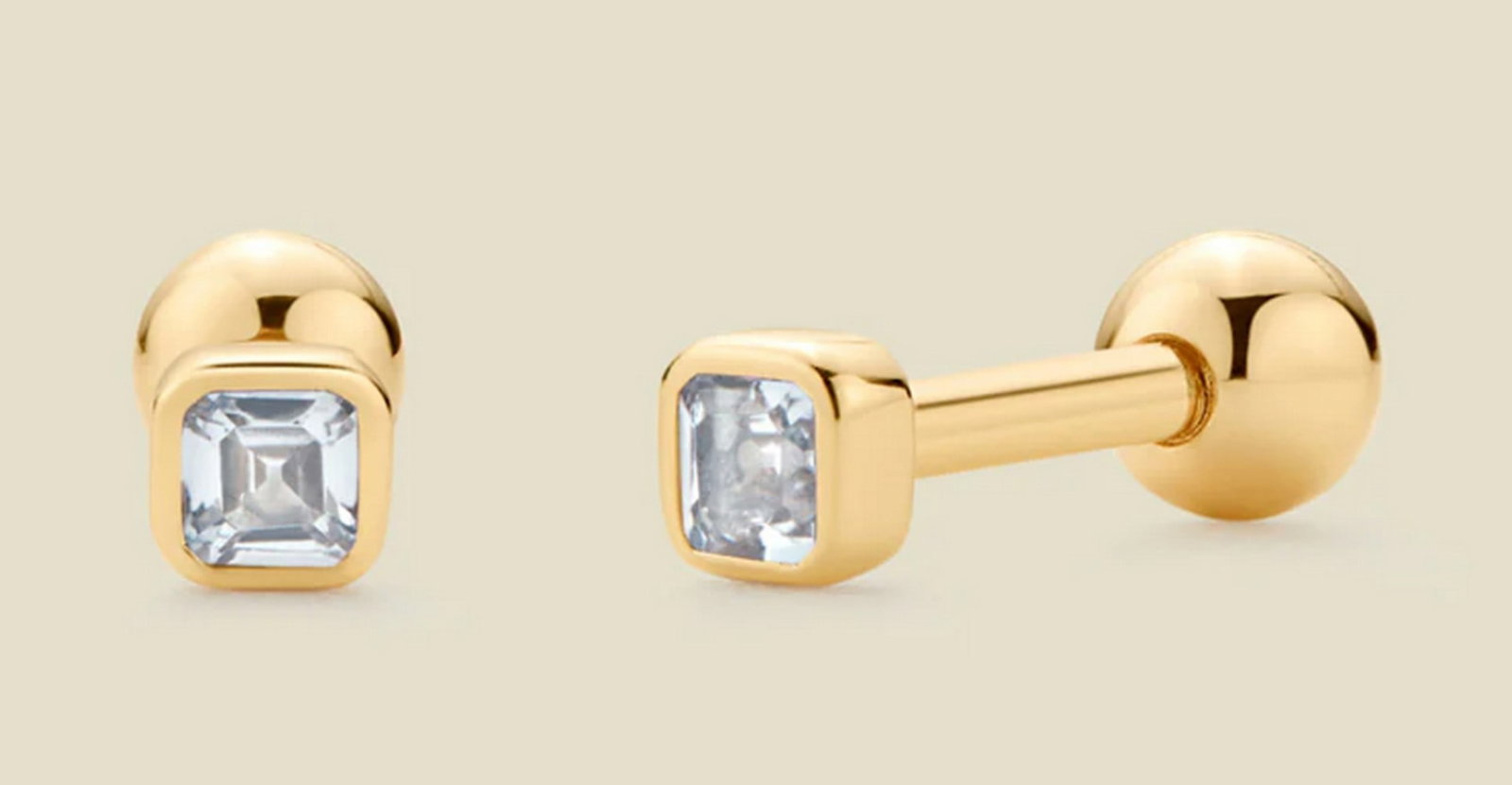 Vermeil Gold & Aquamarine Stud Earrings: Vermeil Gold &; Aquamarine Stud Earrings This squared Asscher cut aquamarine CZ birthstone, a symbol of beauty, is bezel-set in gold vermeil for a minimalist yet striking pop of color. Designed for