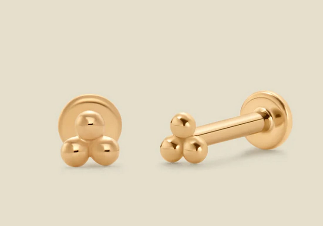 14k Solid Gold Trinity Stud Earrings: 14k Solid Gold Trinity Stud Earrings A touch of shine meets effortless sophistication in these classic bead-style earrings. Crafted in solid gold with a flawlessly polished finish, each petite