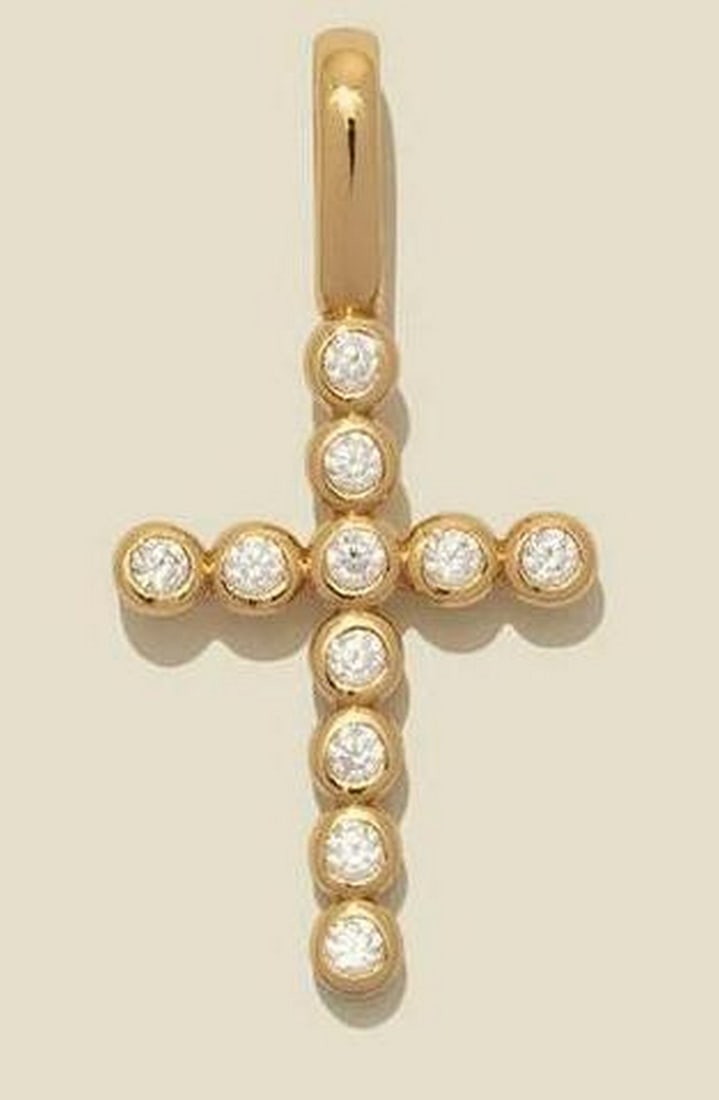 Vermeil Gold & CZ CZ Poppy Cross Charm: Vermeil Gold &; CZ CZ Poppy Cross Charm This delicate cross charm showcases our signature CZ Poppy design, offering a uniquely beautiful symbol of faith and grace. A radiant reminder that you are