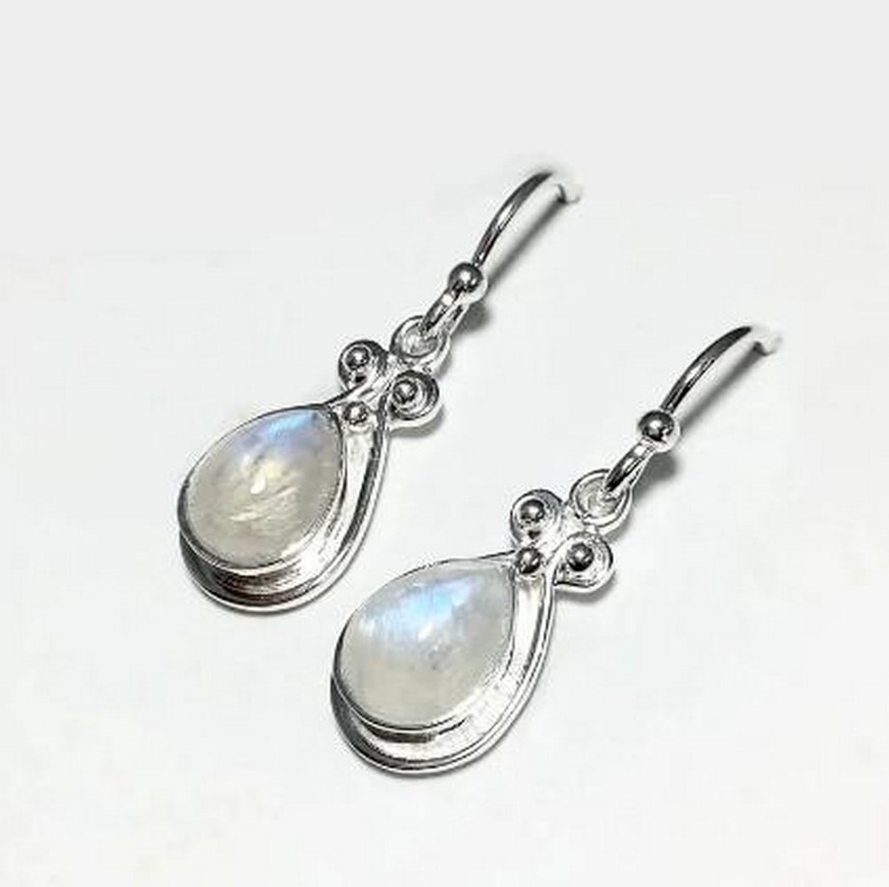 Rainbow Moonstone Drop Earrings: Rainbow Moonstone Drop Earrings These Rainbow Moonstone Drop Earrings feature the ethereal glow of moonstone, with flashes of iridescent blue and white that shift with movement. Known for its