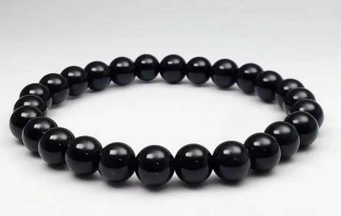 Midnight Black Onyx Bracelet: Midnight Black Onyx Bracelet Bold and sophisticated, this black onyx beaded bracelet exudes timeless elegance. Each smooth, polished bead showcases the deep, velvety black of onyx, a stone known for s